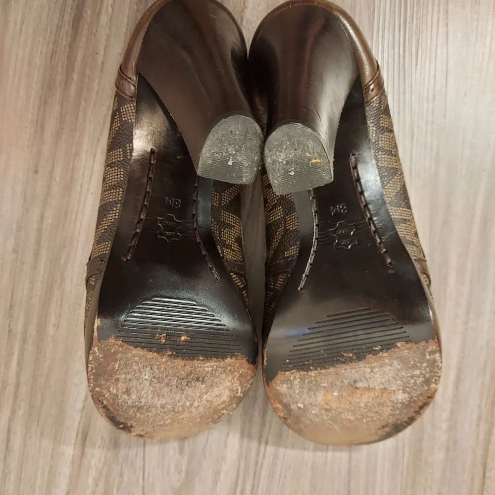 Michael kors monogrammed peep toe tassle heels